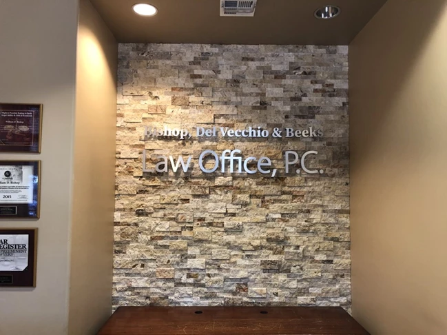 Custom Reception Sign Installed on Cultured Stone