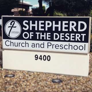 Architectural monument signage Shepherd of the Desert