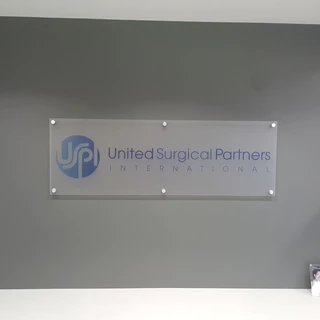 Architectural reception signage united surgical