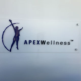 Reception signs for APEX Wellness in San Francisco, CA
