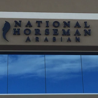 Illuminated Building Sign for National Horsemen in Scottsdale Arizona